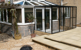 The Mathews' aviary extending from their conservatory. 